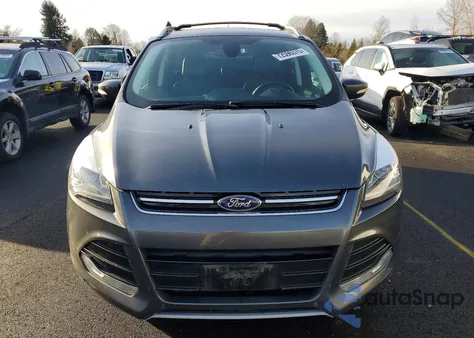 2015 Ford Escape Titanium z USA, uszkodzony, nr VIN 1FMCU9J98FUB06549